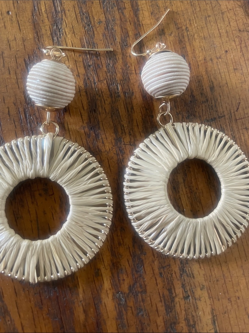 Gold and straw hoop earrings